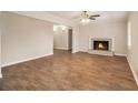 Spacious living room with fireplace and hardwood floors at 4071 Williamsburg Dr, Atlanta, GA 30337
