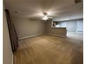 Spacious living room with neutral walls and carpeted floors at 990 Harbins Rd # 5D, Norcross, GA 30093