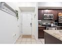 Entryway with kitchen and stainless steel appliances at 955 Juniper St Ne # 4022, Atlanta, GA 30309