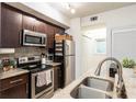 Modern kitchen with granite counters and stainless steel appliances at 955 Juniper St Ne # 4022, Atlanta, GA 30309