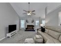 Spacious living room featuring a fireplace and comfy seating at 770 Dunagan Forest Dr, Lawrenceville, GA 30045