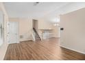 Spacious living room with hardwood floors and loft area at 3901 W Wood Path, Stone Mountain, GA 30083