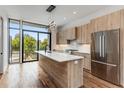 Modern kitchen with stainless steel appliances and island at 105 Georgia Se Ave # 1, Atlanta, GA 30312