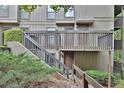 Wooden deck and stairs leading to a condo entrance at 2510 Cumberland Se Ct, Smyrna, GA 30080