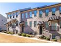 Three-story brick townhouses, modern design at 4292 Foxtail Pine Aly, Doraville, GA 30360