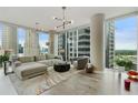 Modern living room with hardwood floors and city views at 1080 Peachtree Ne St # 1402, Atlanta, GA 30309