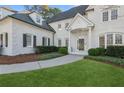 Front entrance with walkway, landscaping, and columns at 115 N Devereux Nw Ct, Atlanta, GA 30327