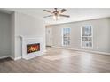 Bright living room with fireplace and laminate flooring at 3530 Kingsbrooke Ct, Decatur, GA 30034