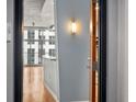 Apartment entryway with hardwood floors and access to living area at 943 Peachtree Ne St # 1109, Atlanta, GA 30309