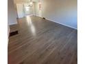 Hardwood floor living room, open floor plan at 116 E Wade St, Oxford, GA 30054