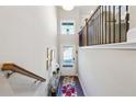 View from upstairs of the entryway with staircase and console table at 505 Stagecoach Bnd, Smyrna, GA 30080