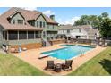 Inviting pool with spacious deck, perfect for relaxation at 5585 Lavender Farms Rd, Powder Springs, GA 30127