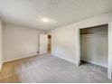 Spacious bedroom featuring a light-colored carpet and a large closet at 170 Pinehurst Dr, Stockbridge, GA 30281