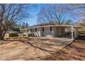 House exterior with carport and yard at 1395 W Austin Rd, Decatur, GA 30032