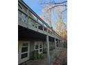 Elevated deck overlooking a wooded area, attached to the house at 190 Valley Cv, Atlanta, GA 30350