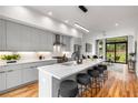 Modern kitchen with island, quartz countertops, and stainless steel appliances at 105 Georgia Se Ave # 2, Atlanta, GA 30312