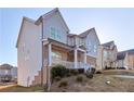 Two story house with gray siding and brick accents at 1501 Still Ridge Ln, Lawrenceville, GA 30045