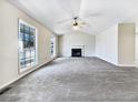 Bright living room with hardwood floors and fireplace at 114 Blake Cv, Douglasville, GA 30134