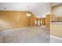 Large living room featuring a fireplace and vaulted ceiling at 447 Two Iron Nw Trl, Kennesaw, GA 30144