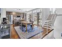 A bright kitchen with modern appliances, light-colored walls, and a view of the outside at 1412 Peter Haughton Nw Way, Atlanta, GA 30318