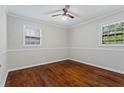Spacious bedroom featuring hardwood floors and neutral decor at 4090 Tara Dr, Forest Park, GA 30297
