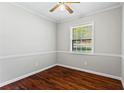 Bright bedroom with hardwood floors and neutral wall colors at 4090 Tara Dr, Forest Park, GA 30297