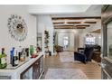 Bright entryway with hardwood floors and a bar cabinet at 5113 Hilltop Dr, Villa Rica, GA 30180