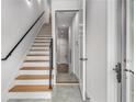 Modern staircase with light wood and metal railing at 105 Georgia Se Ave # 4, Atlanta, GA 30312