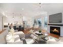 Bright living room with hardwood floors, fireplace, and large windows at 1099 Hawthorne Ne St, Atlanta, GA 30307