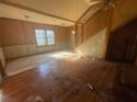 Hardwood floors and large windows in living room at 214 Pinewood Ln, Stockbridge, GA 30281