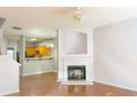 Living room with fireplace and kitchen view at 2372 Johnson Rd, Atlanta, GA 30345