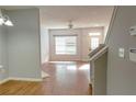 Hardwood floor living room with staircase at 2372 Johnson Rd, Atlanta, GA 30345