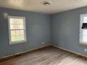 Simple bedroom with hardwood floors and neutral walls at 2909 Diana Sw Dr, Atlanta, GA 30315