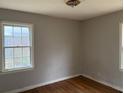 Empty bedroom with hardwood floors and neutral walls at 2909 Diana Sw Dr, Atlanta, GA 30315