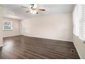 Spacious living room featuring hardwood floors and a ceiling fan at 459 Oak Se Dr, Atlanta, GA 30354