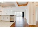 Open concept kitchen with granite counters, stainless steel appliances, and hardwood floors at 620 Peachtree Ne St # 415, Atlanta, GA 30308