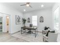 Bright home office with hardwood floors and built-in shelving at 1036 Donnelly Sw Ave, Atlanta, GA 30310