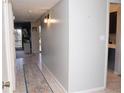 Bright hallway with tile floors and access to other rooms at 4846 Twin Lakes Trl, Atlanta, GA 30360