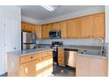 Modern kitchen with stainless steel appliances and an island at 962 Pierce Ivy Ct, Lawrenceville, GA 30043
