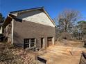 Detached brick garage with workshop space at 144 Rockbridge Sw Rd, Lilburn, GA 30047