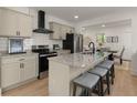 Modern kitchen with stainless steel appliances and island at 1639 Stokes Sw Ave, Atlanta, GA 30310