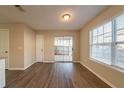 Dining area with wood-look flooring and access to backyard at 444 Kara Ln, Mcdonough, GA 30253