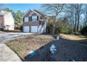 Two-story house with a two-car garage and fire hydrant at 2770 Stony Place Ct, Grayson, GA 30017