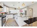 Spacious kitchen featuring granite countertops and stainless steel appliances at 575 Maple Crest Dr, Lawrenceville, GA 30044