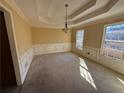 Bright dining room with wainscoting and neutral colors at 4342 White Surrey Nw Dr, Kennesaw, GA 30144