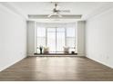 Bright living room featuring a bay window and hardwood floors at 400 17Th Nw St # 2419, Atlanta, GA 30363