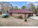 Brick house with attached garage and large yard at 4055 Thaxton Rd, Atlanta, GA 30349