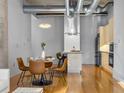 Modern kitchen with stainless steel appliances, ample cabinetry, and breakfast bar at 1058 Piedmont Ne Ave # 302, Atlanta, GA 30309