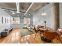 Bright living room featuring hardwood floors and ample natural light at 1058 Piedmont Ne Ave # 302, Atlanta, GA 30309