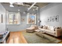 Spacious living room with hardwood floors and neutral color palette at 1058 Piedmont Ne Ave # 302, Atlanta, GA 30309